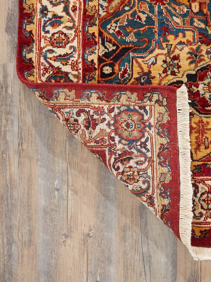 Back view of Traditional Heriz Rust Jaipur Wool Hand-Knotted Rug showing the finishing and quality craftsmanship