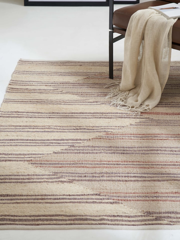 Close-up of Geo Stripes beige brown jute & cotton natural fibre rug, showing texture details