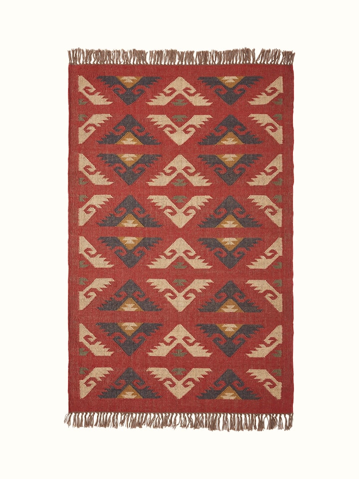 Front view of Traditional kilim red lawan wool & jute panja dhurrie showing the red and jute pattern