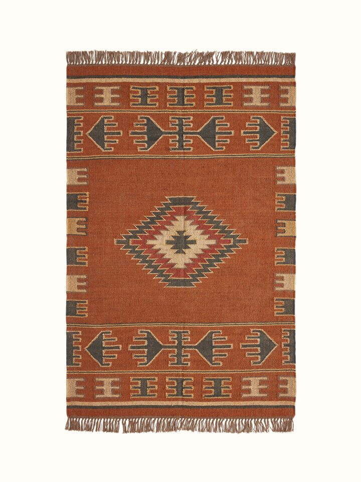 Front view of Traditional Kilim rust lawan wool & jute panja dhurrie highlighting the vibrant rust color and intricate kilim pattern