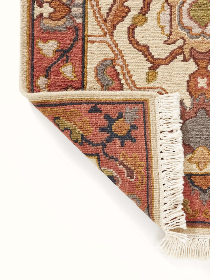 Oushak traditional off-white Bhadohi wool hand-knotted runner rug, detailed view of texture.