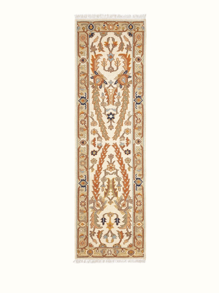 Front view of Nomad traditional off-white Bhadohi wool hand-knotted runner with intricate patterns and an off-white shade.