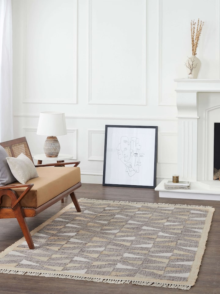 Close-up of Graphic geo beige brown jute natural fibre rug, highlighting the geometric design and jute texture.
