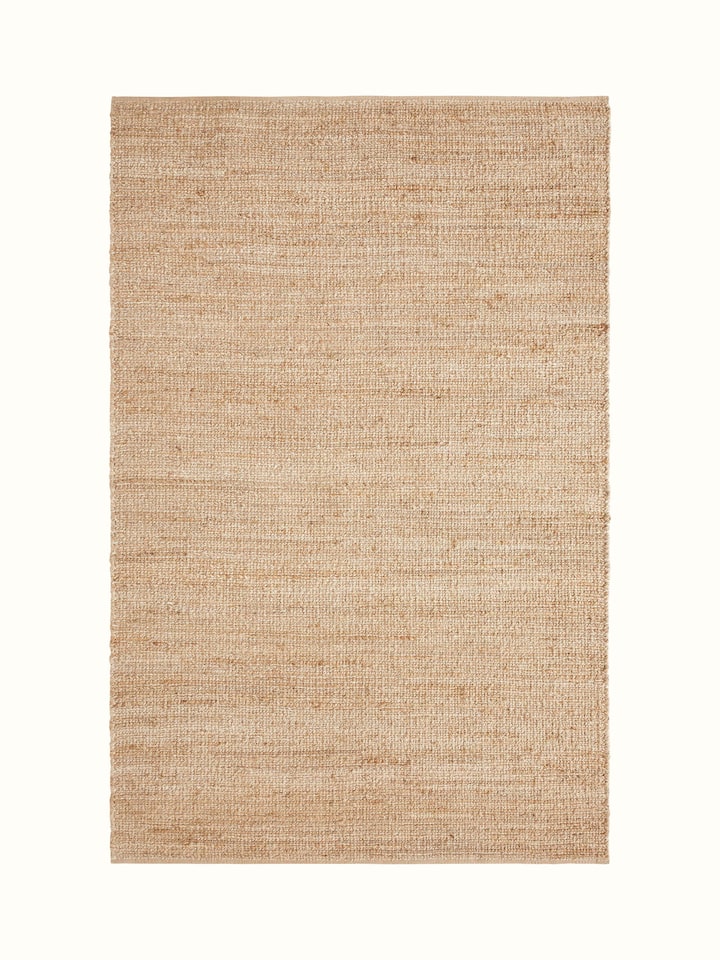 Full view of textured solid beige jute & wool natural fibre rug (5x8 ft) highlighting its natural fiber composition and solid beige color.