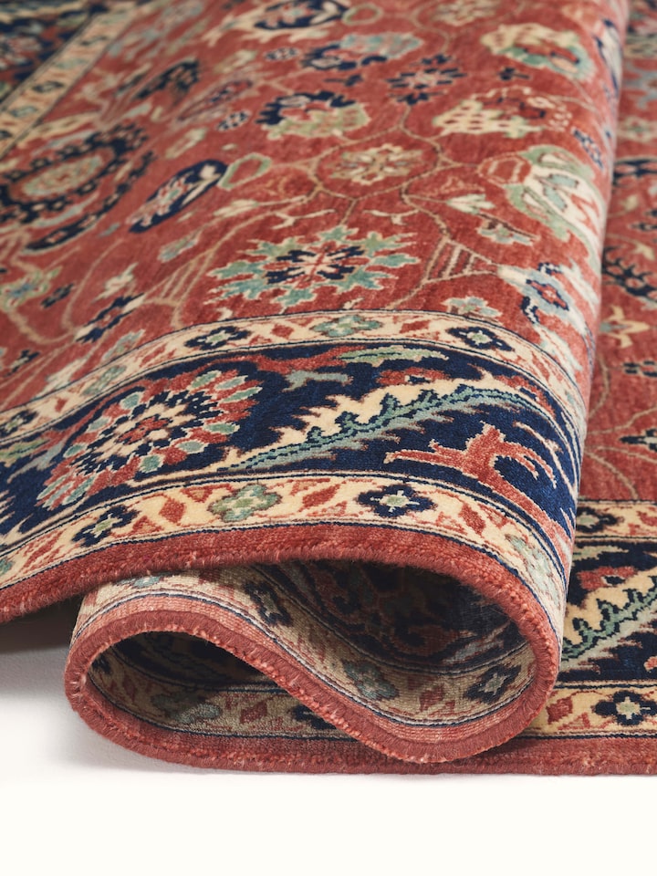 Detail view of Traditional Guldasta Rust Bhadohi Wool Hand-knotted Rug highlighting the intricate pattern and pile texture