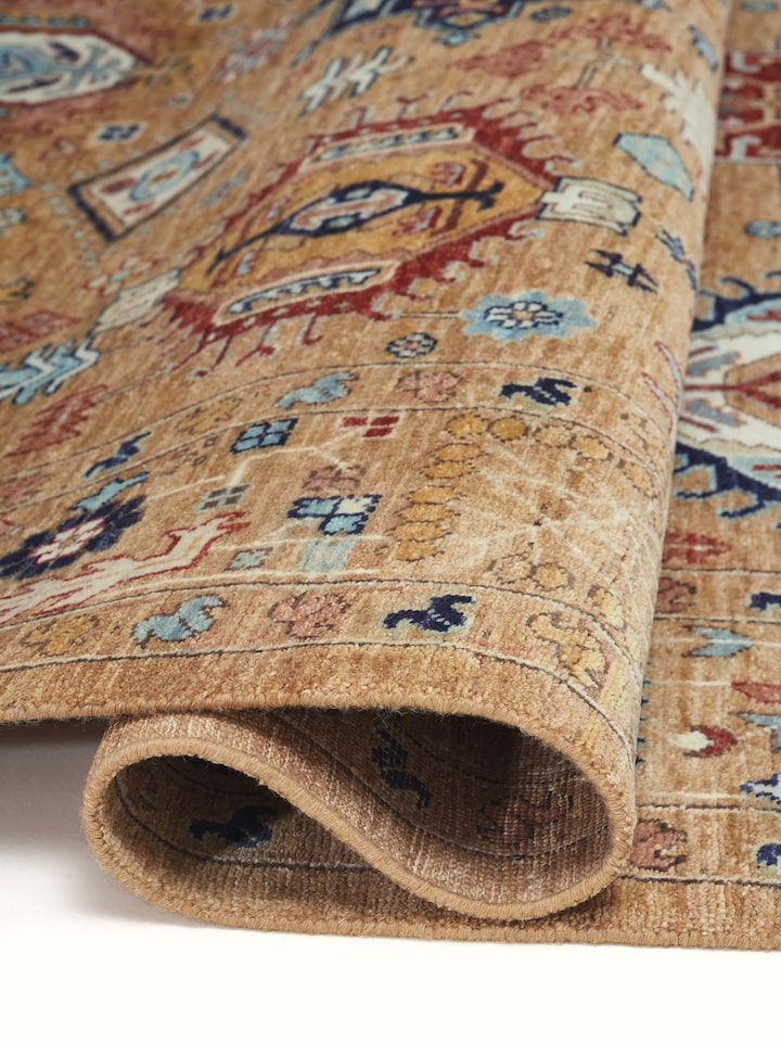 Side view of Traditional Tabriz beige Bhadohi wool hand-knotted rug