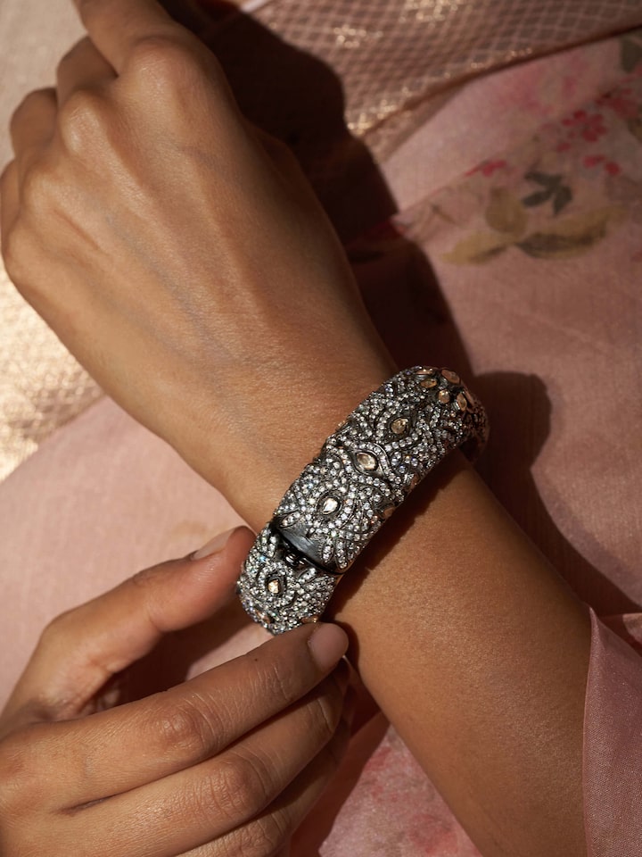 Styled view of Silversmithing Bangle worn on the wrist, showing how it looks styled