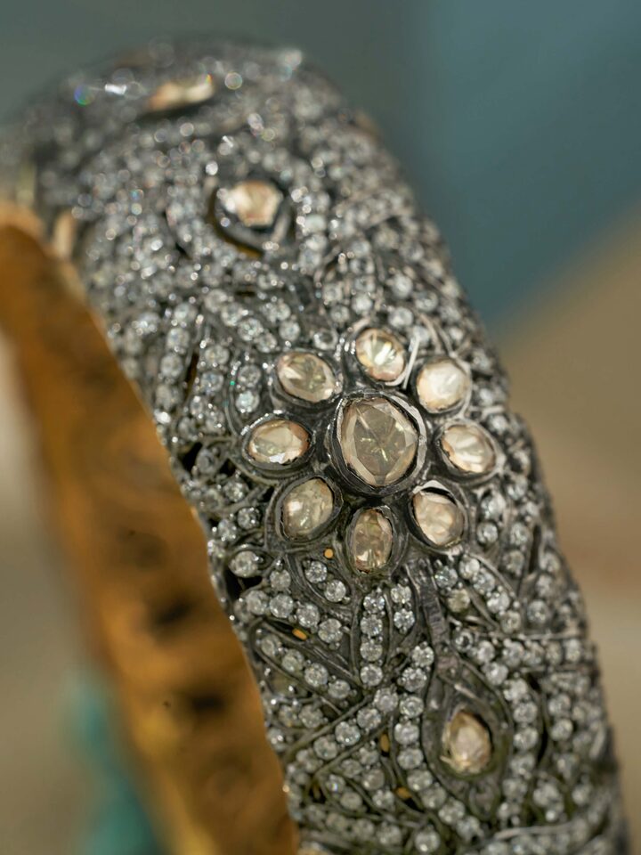 Detail view of Silversmithing Bangle highlighting the stone setting and metalwork detail
