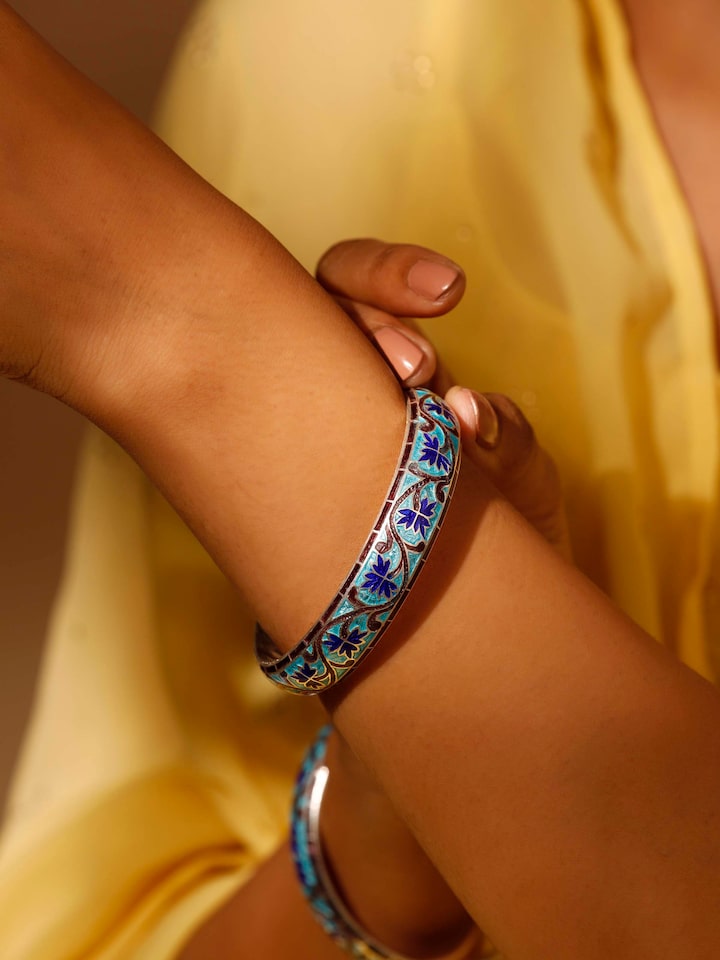 Close-up view of Blue Meenakari Silver Bangles (2 pcs) highlighting intricate designs.