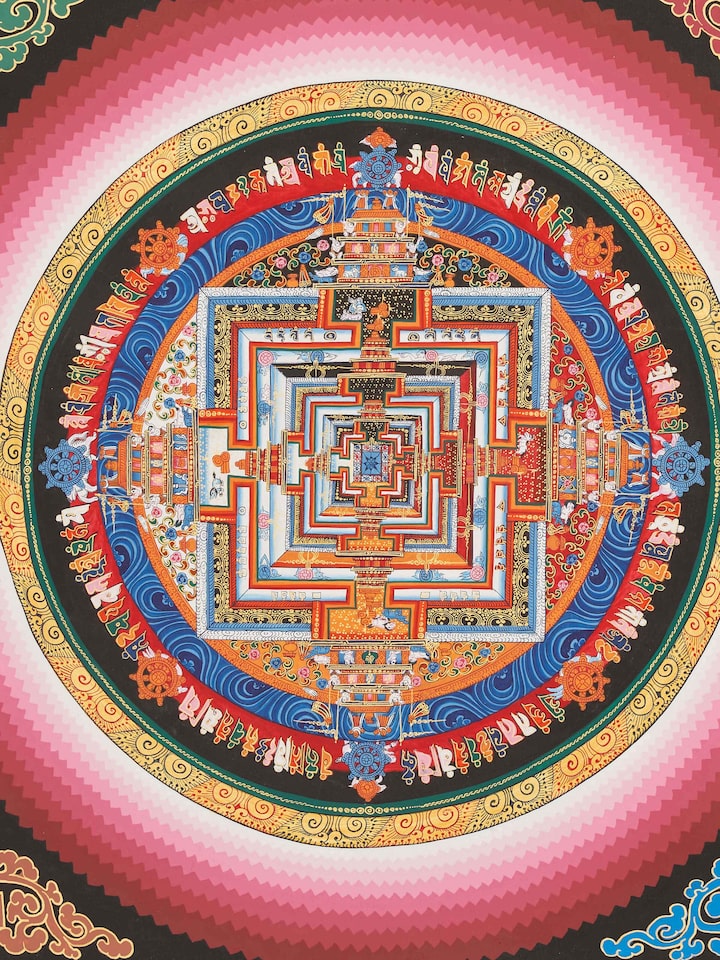 Side view of Thangka mandala painting emphasizing its traditional design