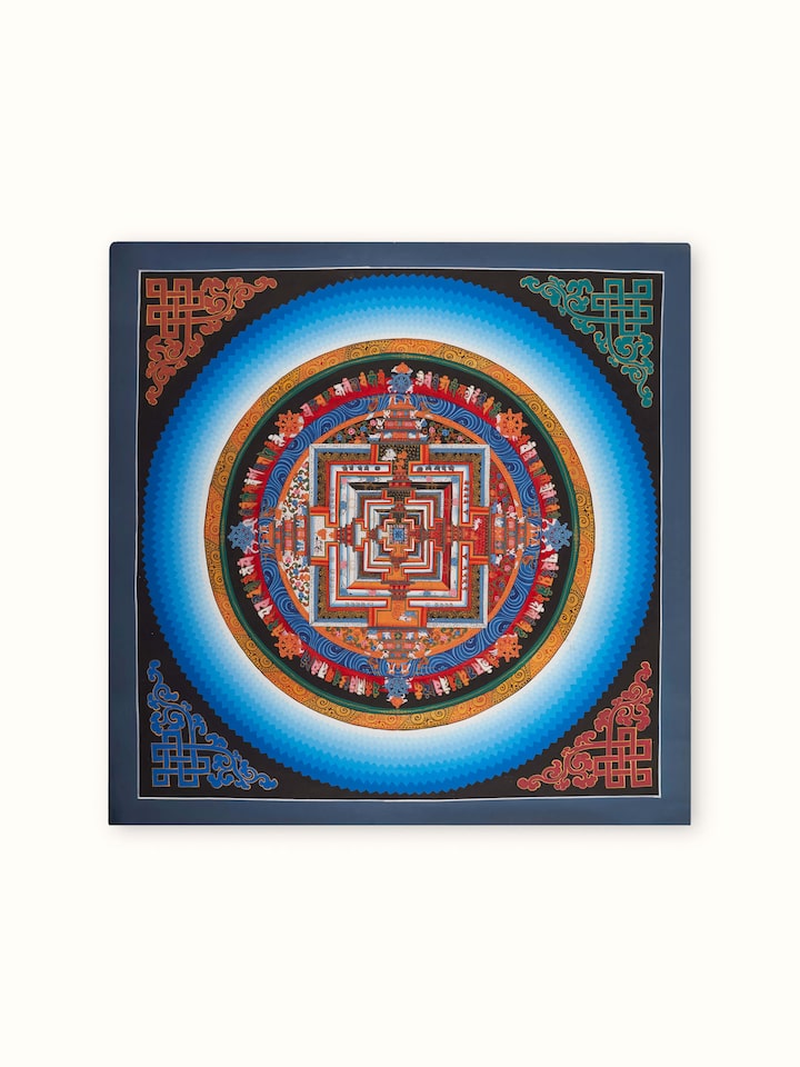Thangka mandala painting with intricate mandala patterns and vibrant colors, showcasing traditional artistry.