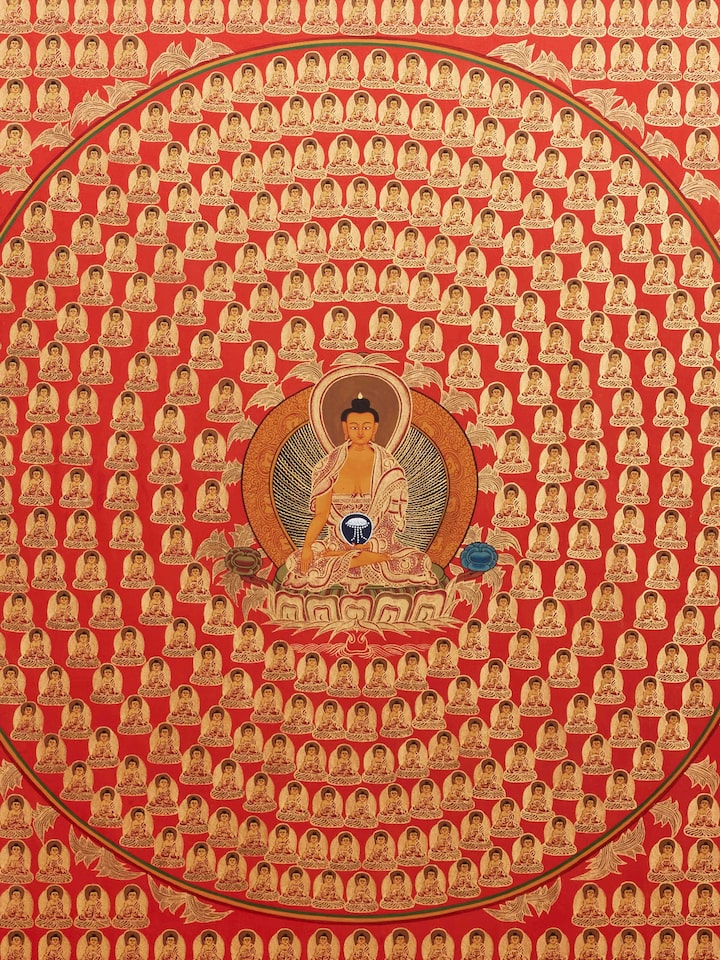 Side view of 1008 Buddha Thangka painting highlighting intricate designs