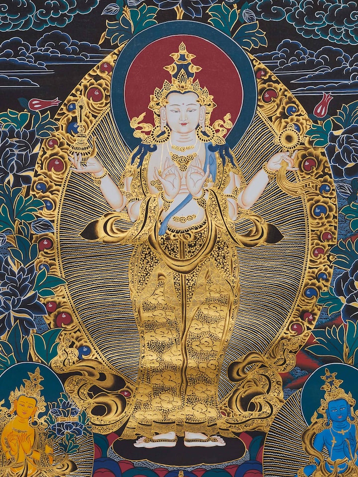 Detailed view of Thangka Compassion Buddha painting, showcasing intricate patterns and vivid colors.