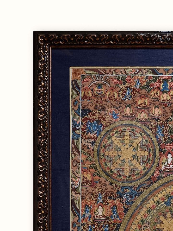 Side view of Thangka mandala painting showcasing depth and vibrant colors in mandala art.