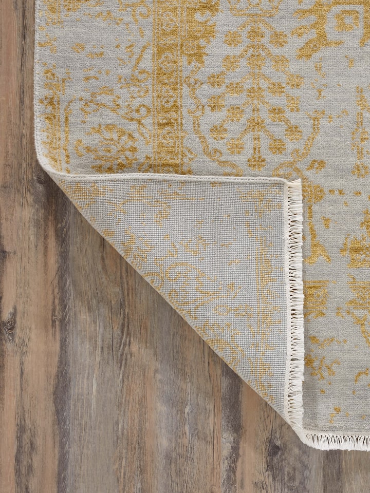 Full shot of Distressed Transitional Grey Gold Agra Wool & Viscose Hand-Knotted Rug, demonstrating the rug's overall design and luxurious feel.