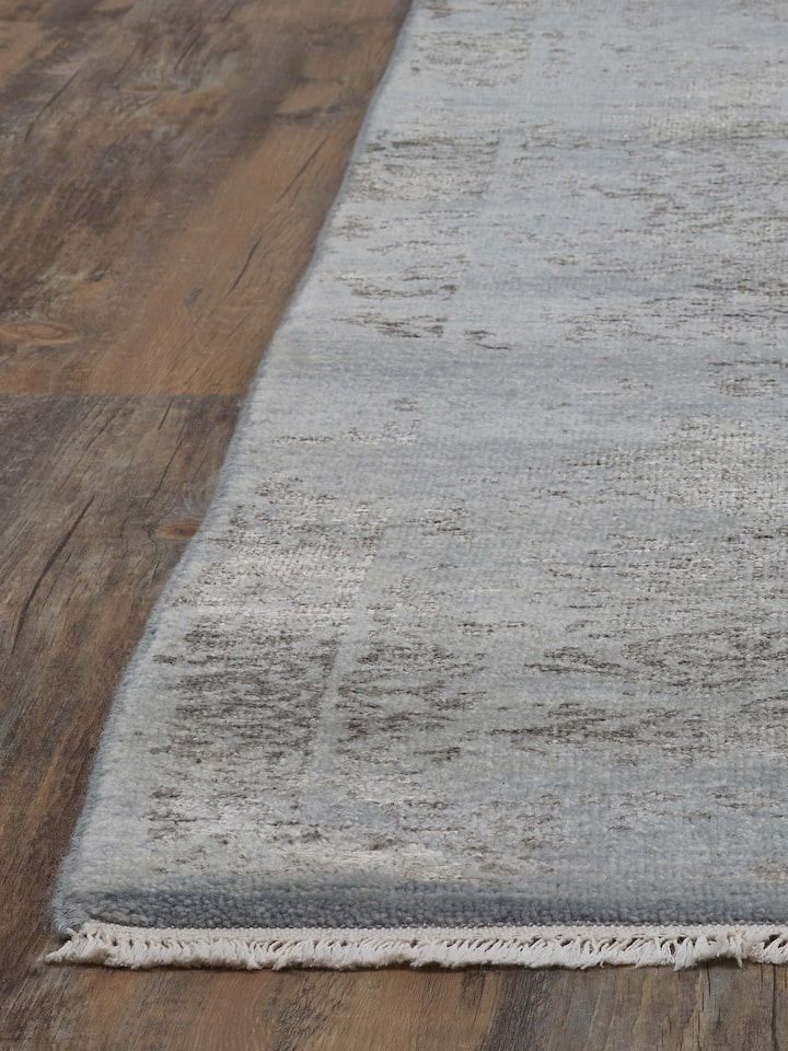 Front view of Distressed Transitional Blue Charcoal Agra Wool & Viscose Hand-Knotted Rug showcasing its distressed pattern.