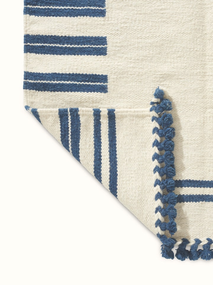 Full shot of Geo Border Ivory Blue Gujarat Wool & Cotton Panja Dhurrie (3x5 ft), demonstrating the overall design and natural fibers used.