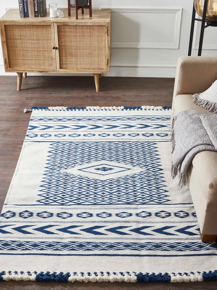 Close-up of Traditional Geo Ivory Indigo Gujarat Wool & Cotton Panja Dhurrie Kharad, showcasing the intricate pattern and texture.