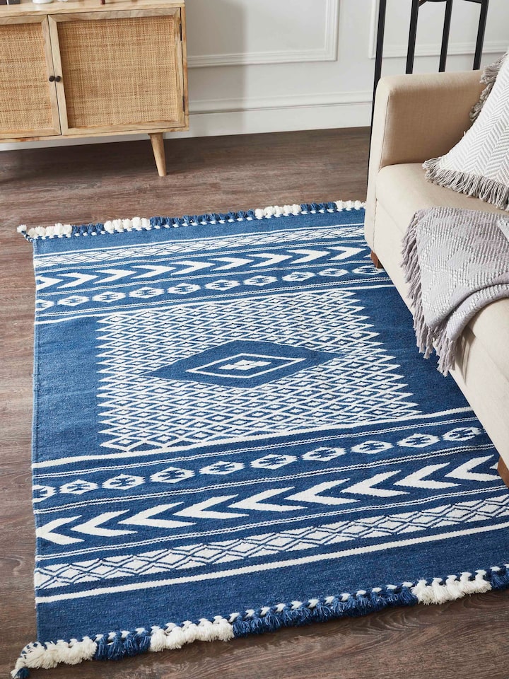 Close-up of Traditional Geo Indigo Ivory Gujarat wool & cotton panja dhurrie kharad (4x6 ft), showing the detailed geometric design and fabric texture.