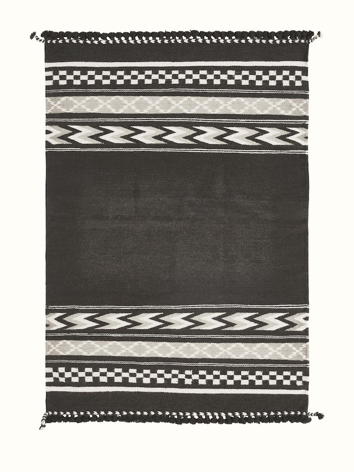 Geo border dark brown Gujarat wool & cotton panja dhurrie kharad (4x6 ft), showcasing the full design and border pattern