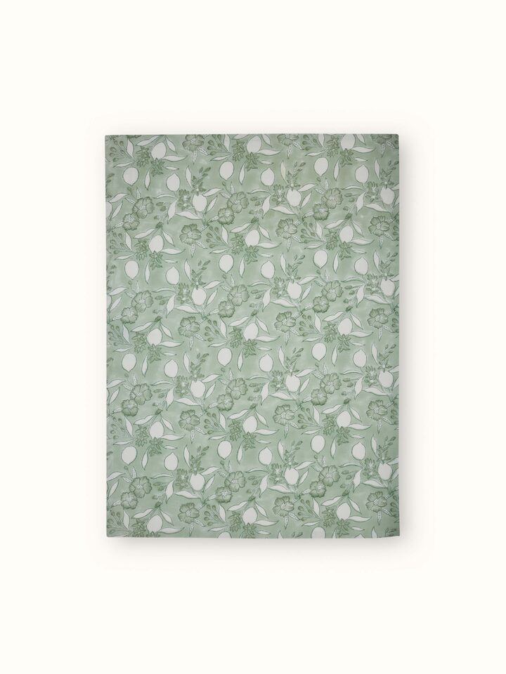 Front view of Anika green floral cotton Sanganeri block printed dish towel showing the vibrant green floral pattern.