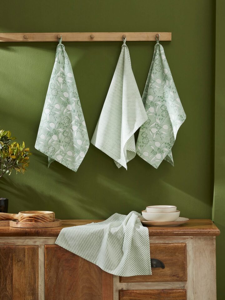 Close-up of Anika green floral cotton Sanganeri block printed dish towel highlighting the detailed floral block print.