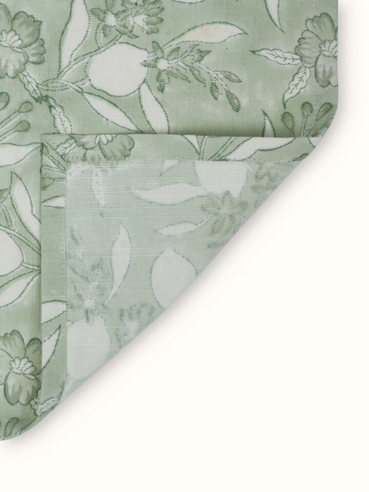 Anika green floral cotton Sanganeri block printed dish towels stacked neatly, showing the set of four.