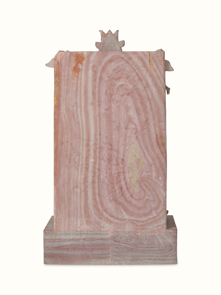 Angle view of Stone Ganesha idol showing the idol in a natural setting