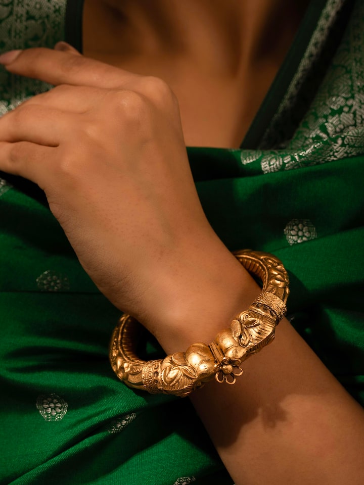 Styled detail view of Silver Smithing Kada worn on the wrist, shown in another styled shot