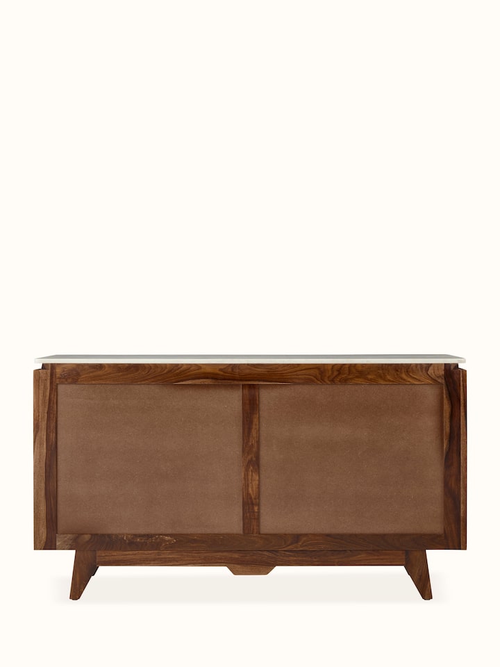 Back side view of the carved Sheesham wood sideboard with a marble top, highlighting intricate wood carvings and marble surface.