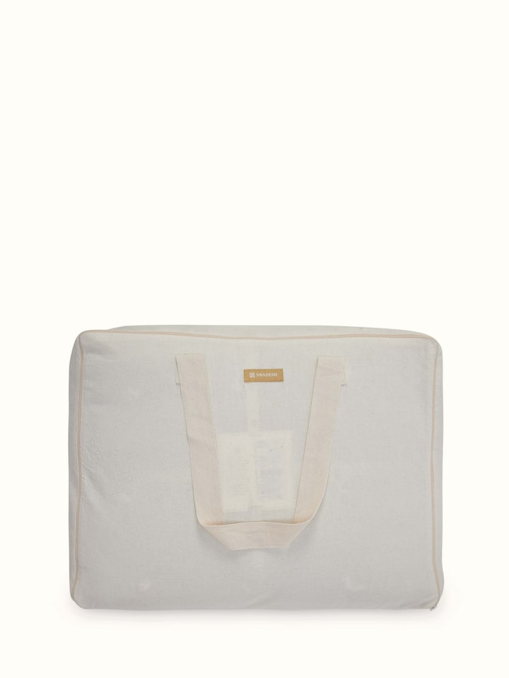 Top view of Anuthi Beige Solid Linen Razai Embroidered Double Quilt, highlighting the overall design and softness.
