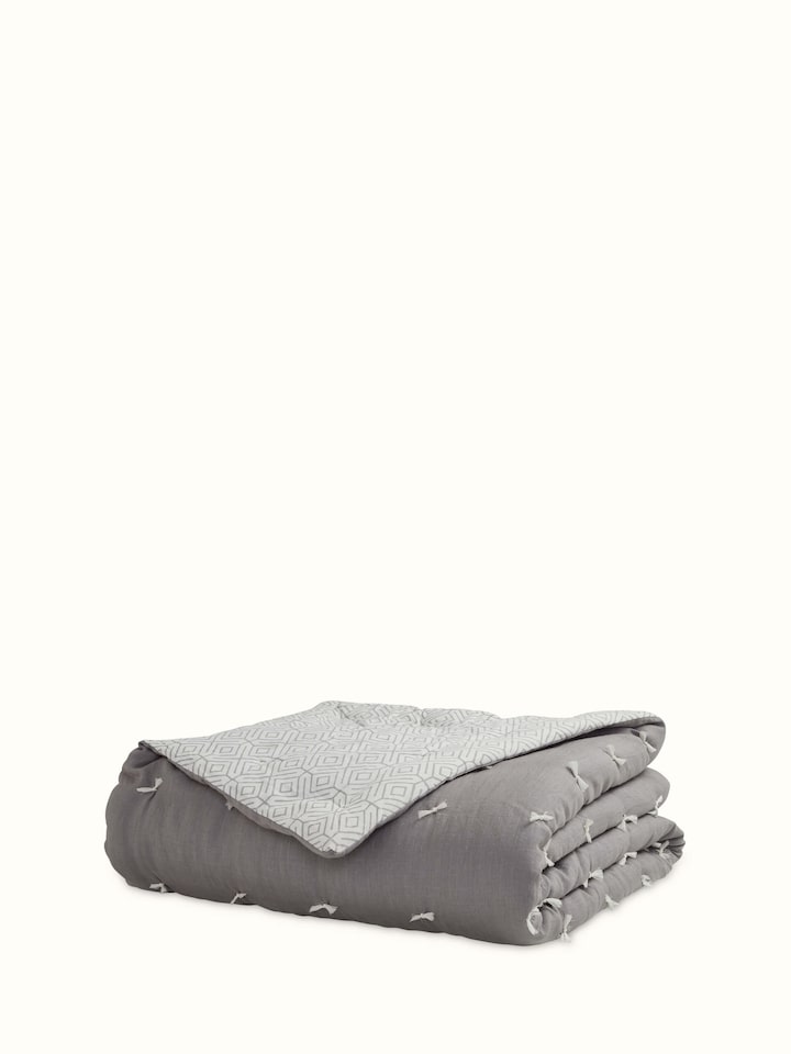 Anuthi grey solid linen razai embroidered double quilt highlighting its embroidered patterns and linen texture