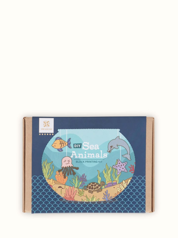 Block painting DIY kit in sea aquarium blue, featuring all necessary supplies for creating ocean-themed artwork.