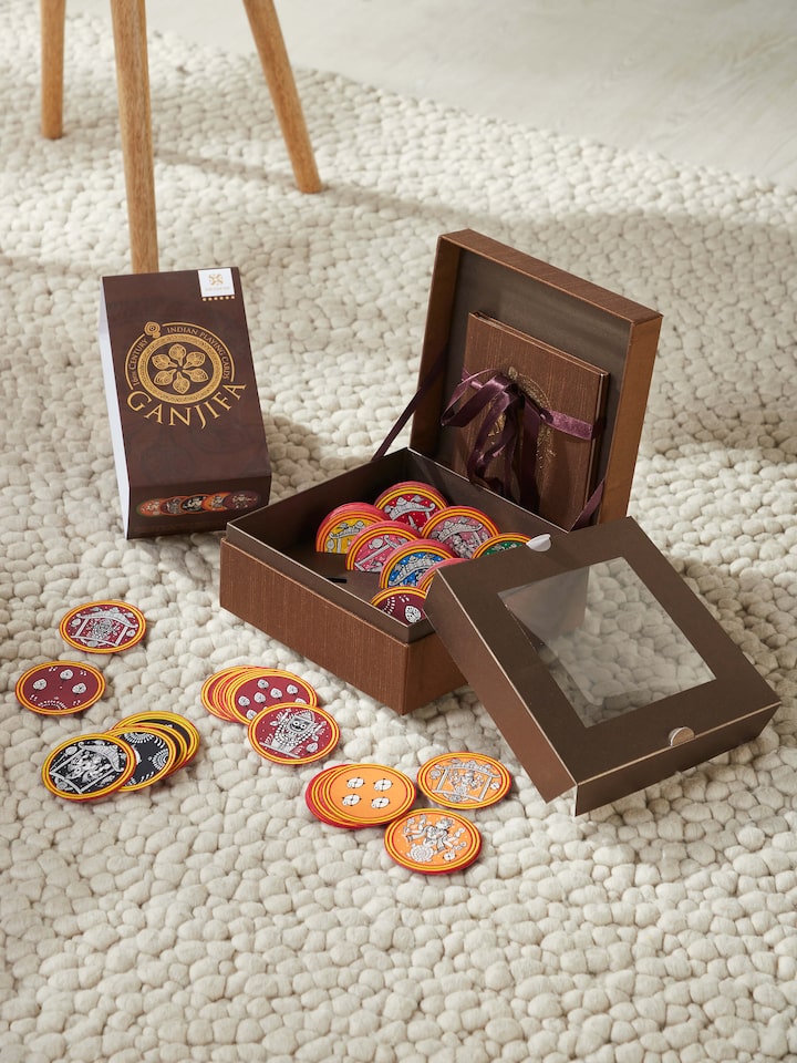Side view of Ganjifa Dashavatar cards brown, showcasing the detailed artwork and design of the cards.