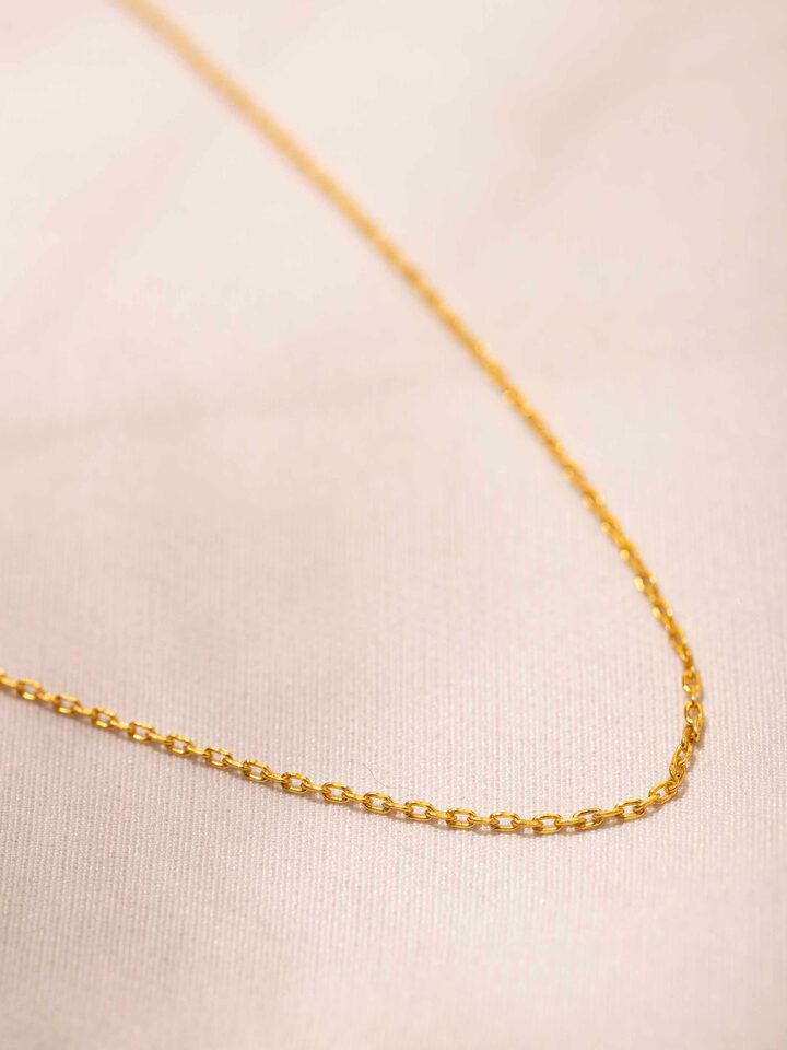 Detailed view of Silver Smithing Chain showcasing the polished silver links and sleek design