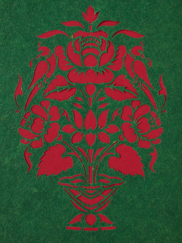 Another view of Sanjhi Paper Stencil Flower Pot with Parrot Wall Art showing different angles and stencil details.