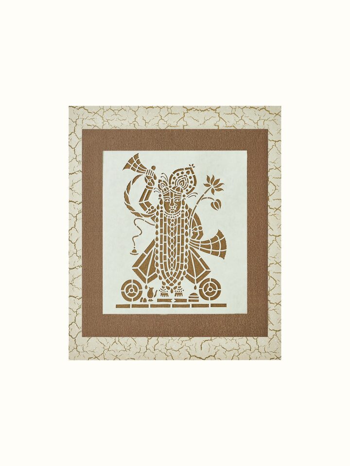 Side view of Sanjhi paper stencil Shreenathji wall art, showcasing its detailed craftsmanship and vibrant colors.