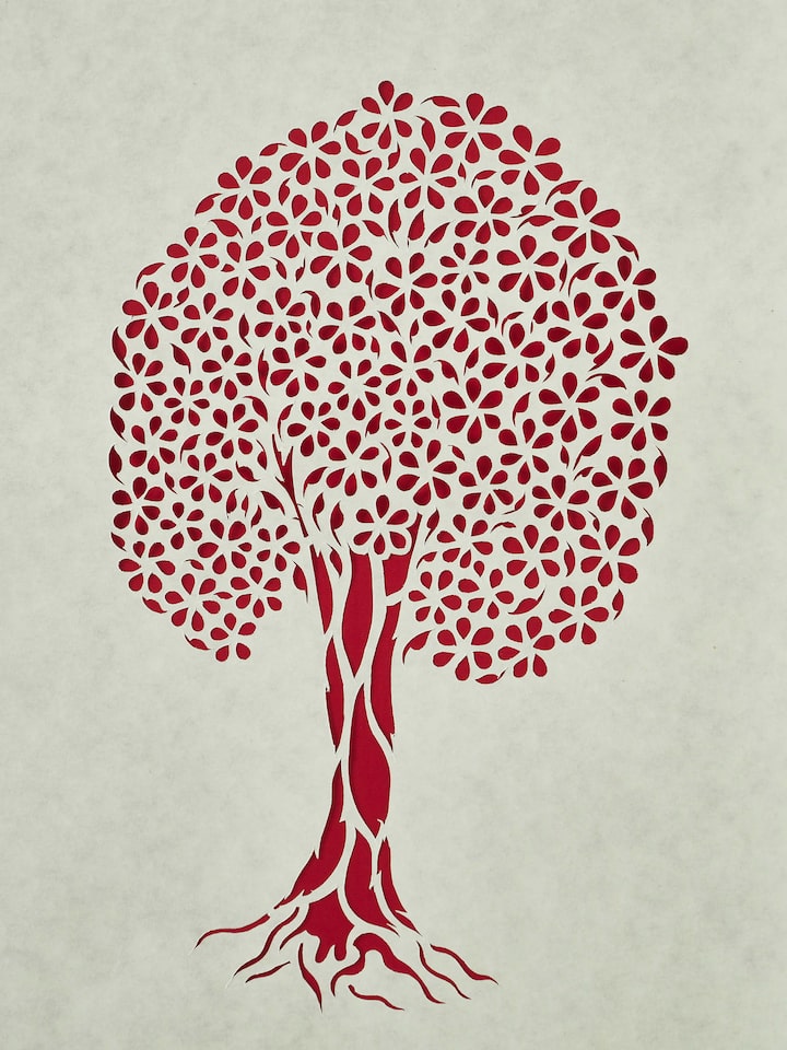 Close-up of Sanjhi paper stencil Mughal tree wall art focusing on fine details