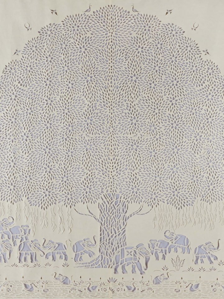 Close-up detail of Sanjhi Paper Stencil Elephants Under Banyan Tree Wall Art highlighting intricate stencil patterns.