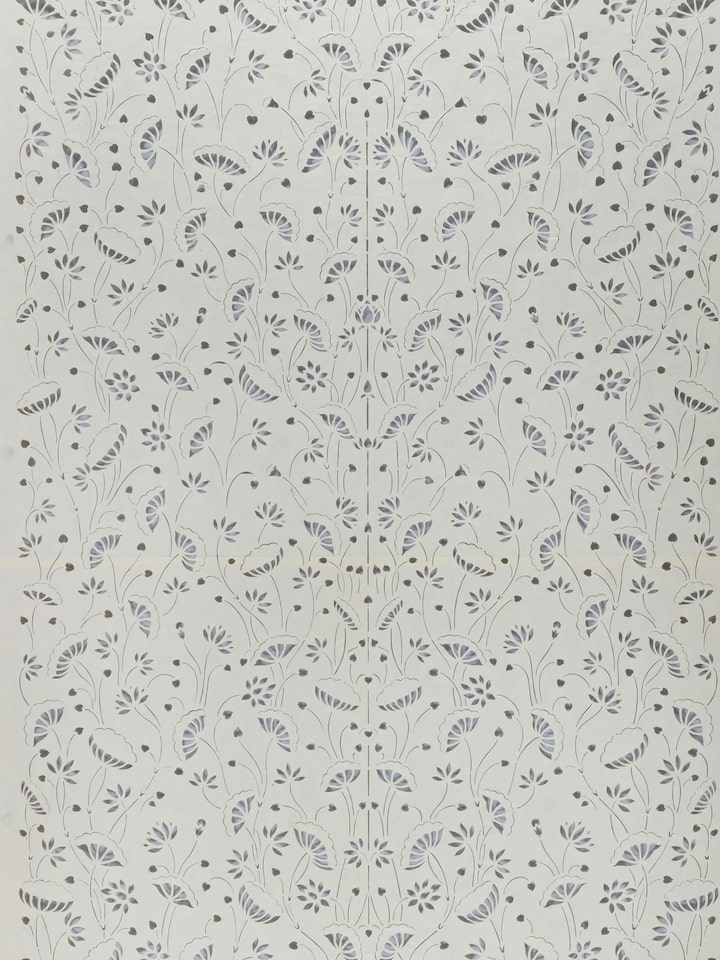 Side view of Sanjhi paper stencil kamal talai wall art highlighting the depth and precision of the stencil work