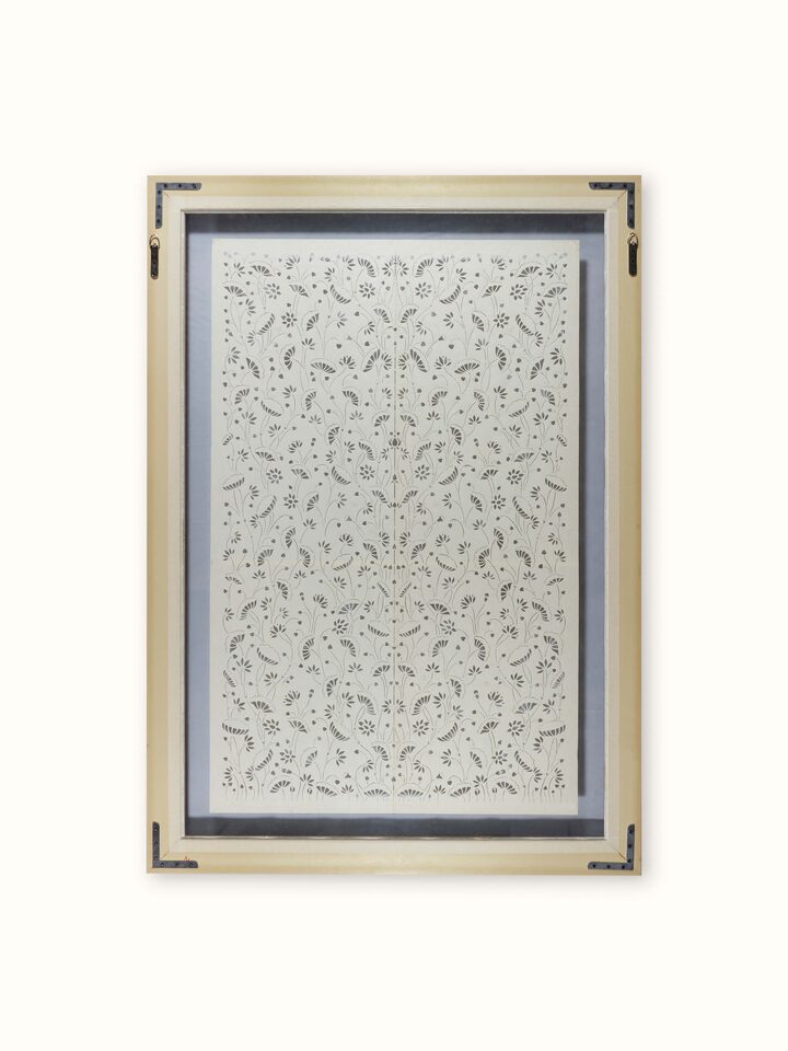Back view of Sanjhi paper stencil kamal talai wall art showcasing the craftsmanship and backing material