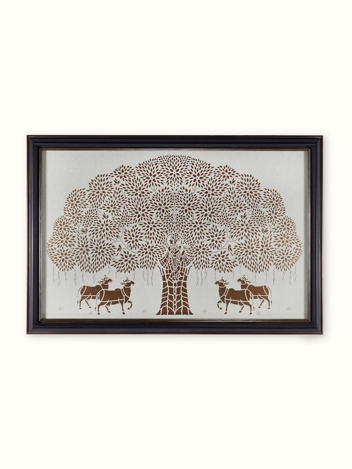Sanjhi paper stencil wall art depicting cows under Krishna tree with vibrant traditional colors