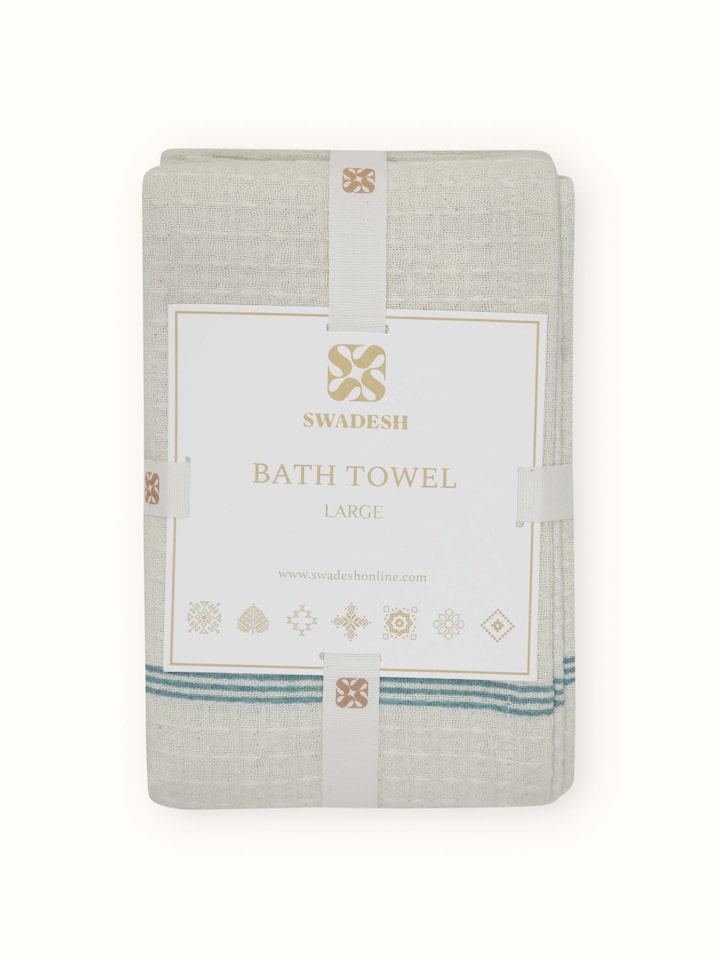 Palampore white floral cotton bath towel, showcasing the elegant design and soft cotton fabric.