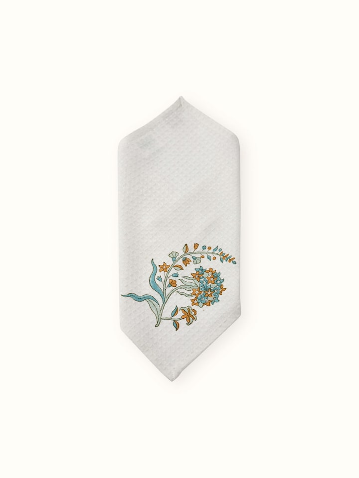 Close-up of Palampore white floral cotton face towel, displaying the Sanganeri block print's fine details and texture.