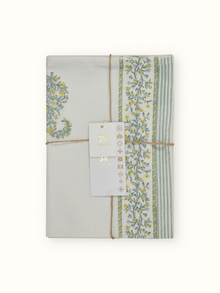 Side view of Ambi stripe yellow floral cotton Sanganeri block printed hand towels (2 pcs) displaying towel’s edge and design