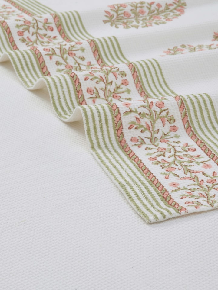 Full view of Ambi border peach floral cotton Sanganeri block printed bath towel (XL) showcasing the peach floral design and generous size.