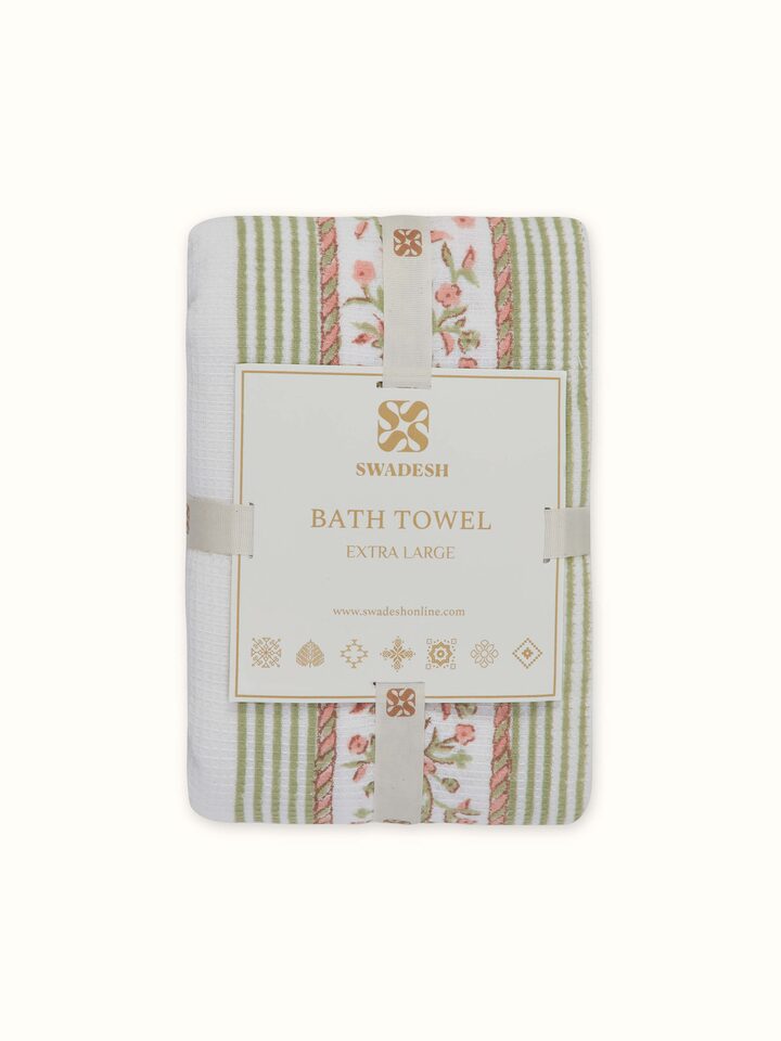 Ambi border peach floral cotton Sanganeri block printed bath towel (XL) displayed with a focus on the border and floral block print.