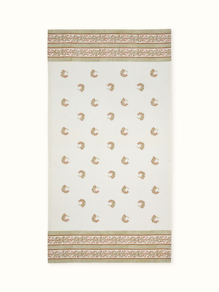 Front view of Ambi allover peach floral cotton Sanganeri block printed bath towel (L), showcasing its vibrant floral design.