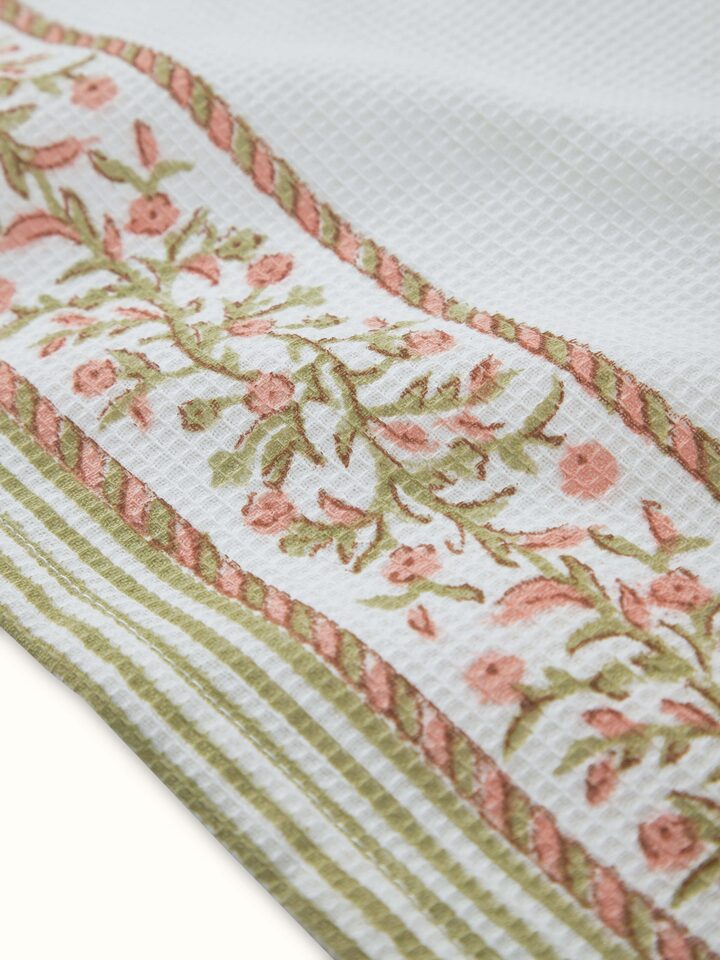 Ambi Stripe Peach Floral Cotton Sanganeri Block Printed Hand Towels laid out, highlighting the floral and stripe patterns.