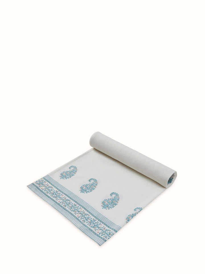 Detailed view of the Ambi border blue floral cotton Sanganeri block printed bath towel (XL), focusing on the fabric weave.